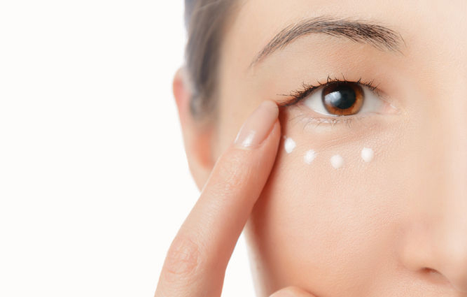 Image result for girl putting on eye cream