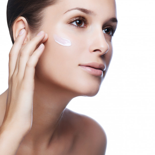 Image result for girl putting on face cream